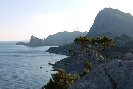 深黑海岸上美丽美丽的山峰高高岩石石头蓝色风景半岛海滩场景假期悬崖旅游图片