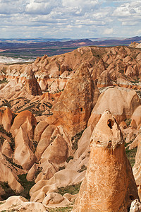 土耳其Goreme附近玫瑰谷公园地质学石头山脉砂岩旅游石灰石岩石圆锥形悬崖图片