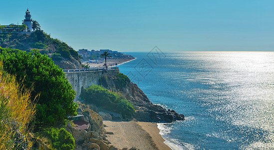 西班牙夏季沙滩阳光表面远景海滨海岸线海面大海海景地方度假图片