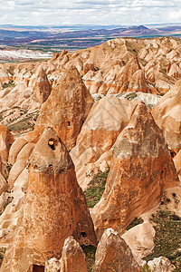 土耳其Goreme附近玫瑰谷爬坡岩石场景公园阳光石灰石火鸡砂岩地形土地图片