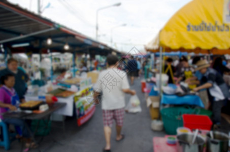 本摘要模糊了在市场上行走的人顾客摄影生活销售公园生产人行道城市节日文化图片