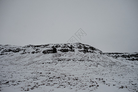 冰岛的雪覆盖地表荒野旅游旅行气候风雨风景季节地形半岛农村图片