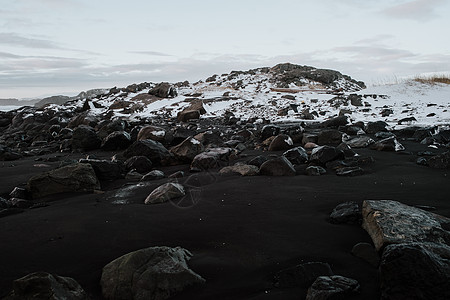 冰岛斯托克克斯内斯的洛基黑沙滩气候石头半岛巨石黑沙低角度天气旅行荒野旅游图片