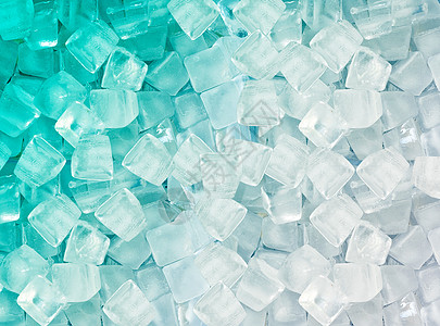水晶城堡带有冰块的背景清凉冻结正方形反射宏观液体辉光冷藏水晶背景