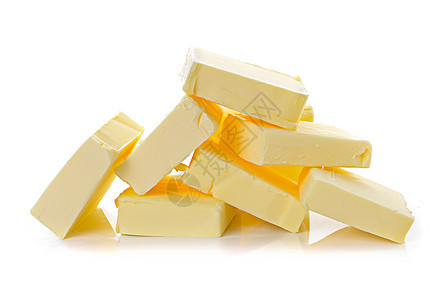 白色背景上的黄油盘子脂肪黄色产品食物卷曲奶制品工作室图片