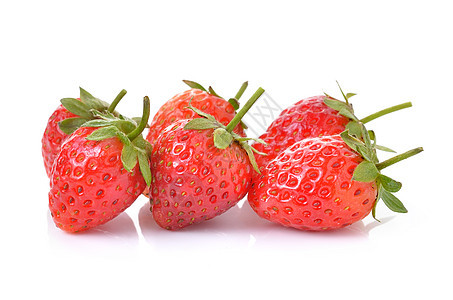 白色背景的草莓种子水果食物叶子甜点宏观浆果红色绿色图片