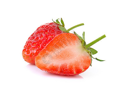 白色背景的草莓种子红色叶子食物水果甜点宏观浆果绿色图片