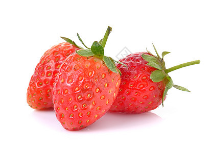 白色背景的草莓食物叶子甜点种子宏观浆果水果绿色红色图片
