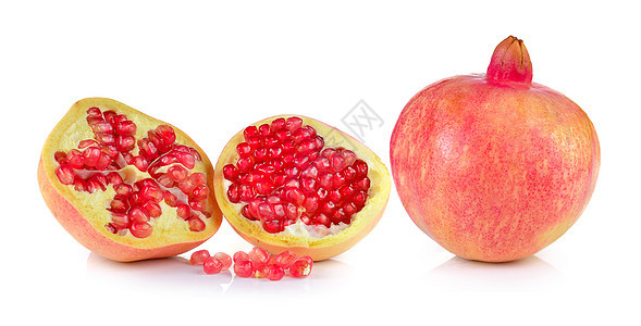 白色背景上的石榴水果热带种子红色食物饮食甜点图片