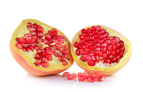 白色背景上的石榴热带红色种子食物甜点水果饮食图片