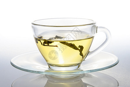 白色背景的茶杯食物饮料草本早餐杯子黄色香气绿色柠檬玻璃图片