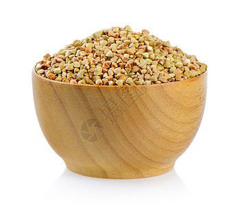 在白色背景上孤立的木碗中的巴克热宏观种子碎粒粮食棕色谷物植物食物饮食图片
