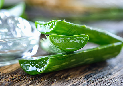 Aloe Vera木木背景叶叶治疗草本植物化妆品植物桌子草本皮肤凝胶药品温泉图片