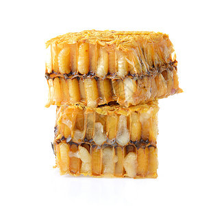 白色背景的蜂窝蜜蜂梳子蜂蜡食物金子产品营养黄色图片