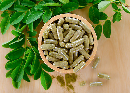 悬浮叶和胶囊健康用药帮助种子粉末萝卜油菜治疗药品黄瓜树叶泻药图片