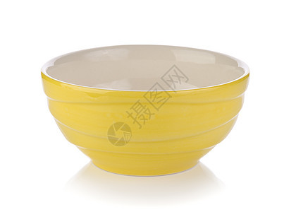 白色背景的黄陶瓷碗背景图片