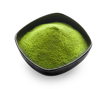 白色背景的碗中的绿茶粉粉末仪式文化草本抹茶饮料食物粉状健康背景图片