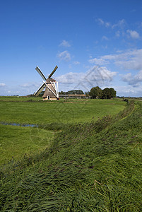 米登莫伦风车建筑风景绿色农业活力纪念碑乡村牧场蓝天草地背景图片