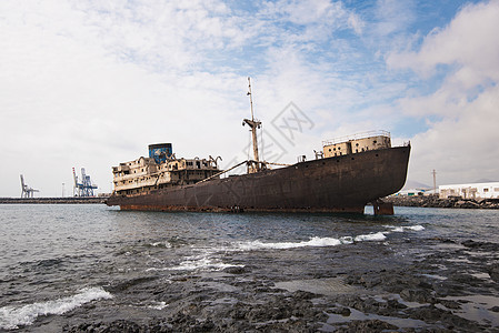 西班牙加那利群岛兰萨罗特的船难腐蚀天空历史蓝色环境支撑海景碰撞海岸海难图片