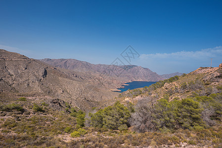 西班牙穆尔西亚州卡塔赫纳湾La Azohia山地景观海岸支撑战略晴天岩石蓝色旅游地标假期海岸线图片