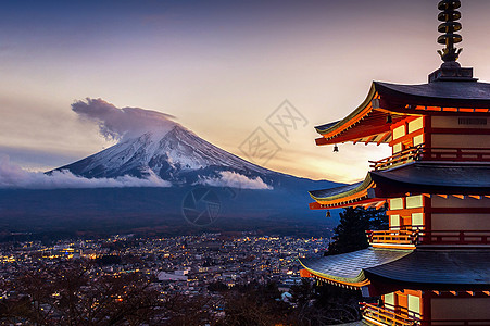 日本樱桃富士山和日本日落时的丘瑞托帕果达等美丽的地标季节神道天空叶子旅行浅间蓝色樱花神社火山背景