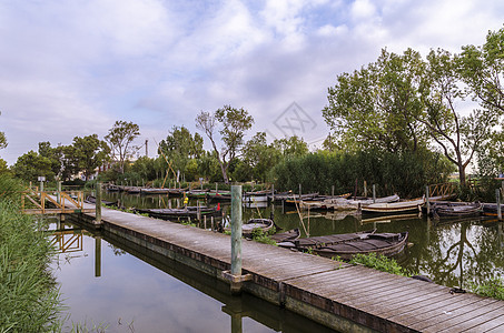 Catarroja港与Albufera的连接木头拉丁帆船港口游客闲暇日落旅游湿地假期图片