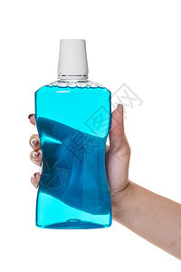 手拿口腔用药膏洗瓶头温泉肥皂护发素泡沫瓶子皮肤蓝色治疗洗发水液体图片