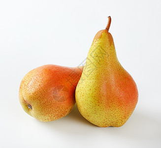 两个成熟的梨子小吃水果甜点黄色橙子食物图片