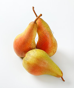 三个成熟的梨小吃食物甜点橙子黄色水果图片