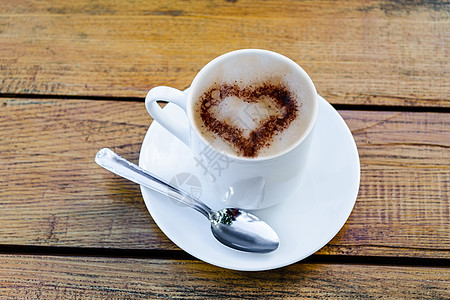 咖啡杯拿铁艺术免费杯子液体气泡勺子饮料桌子咖啡店香气牛奶图片