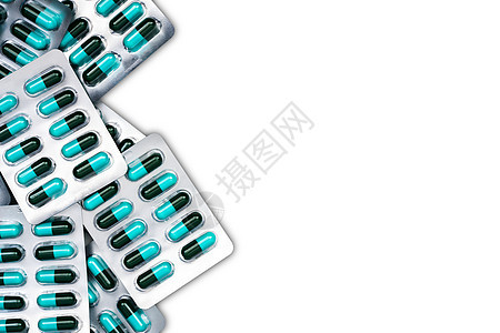 蓝色和绿色抗生素胶囊药丸在白色背景上与复制空间隔离的泡罩包装的顶部视图 抗菌药物耐药与合理用药观念 医药行业 药房背景 全球医疗图片