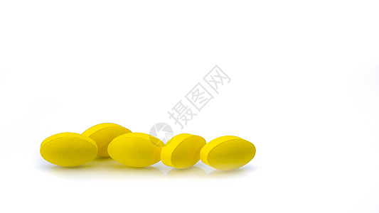 白色背景的黄色椭圆形药丸 具有美丽的创意图案和文本复制空间 轻度至中度疼痛管理 止痛药科学药店疾病制造业宏观抗炎偏头痛药物处方制图片