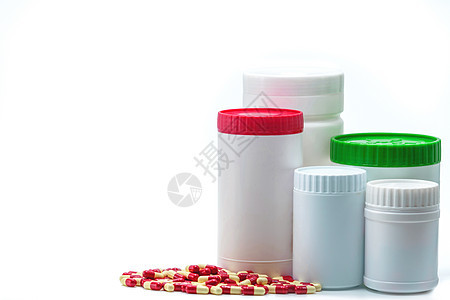 抗生素胶囊丸与空白标签塑料瓶容器隔离在白色背景 医药行业 药房背景 抗菌药物耐药性 全球医疗保健概念图片