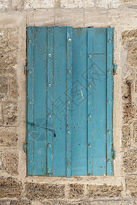 隔离墙框架蓝色石头街道旅行入口历史建筑窗户硬木图片