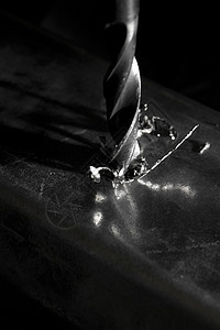 金属钻探技术作坊力量穿孔灰色乐器铣削黑色钻孔工程图片