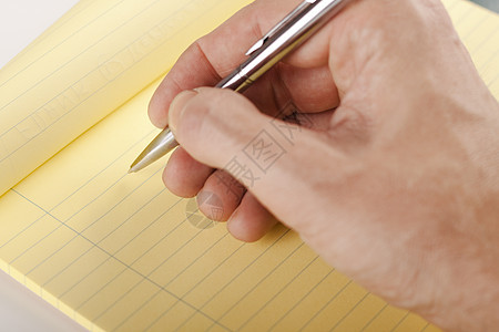 伸手铅笔商业办公室训练黄色桌子笔记笔记本拇指文档图片
