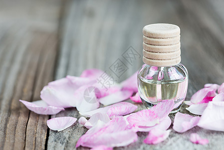 玫瑰基本石油木头保健脆弱性温泉药品化妆品花瓣香水小瓶玻璃图片