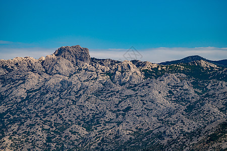 克罗地亚国家公园极端山区场景天空旅游石灰石石头全景观光蓝色岩石悬崖图片