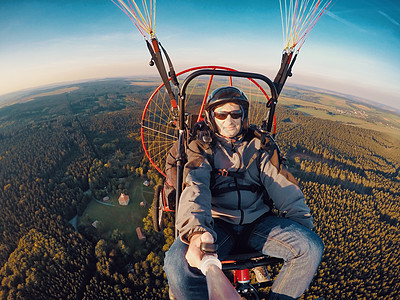 动力滑滑翔式同步飞行扇子运动航空行动乐趣冒险自由段落力量头盔图片
