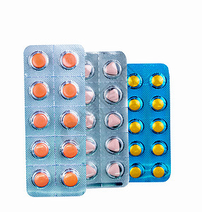 在白色背景上分离的泡罩包装中的双氯芬酸 包装有圆形和三角形的药物 薄膜包衣片剂 橙色 黄色和淡粉色的药丸 止痛药 药店图片