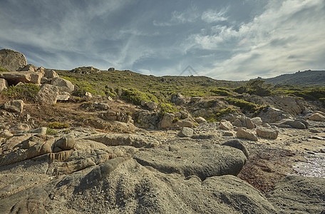 完全自然的地中海海岸的详细信息丘陵海岸热带矿物沙丘海滩天空岩石旅游沙漠图片