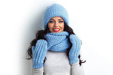 穿着温暖衣服的妇女羊毛针织毛衣幸福手套女性女孩围巾蓝色女士图片
