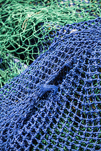 旧渔网海洋食物渔夫软木尼龙绳索渔业缠绕木头齿轮图片