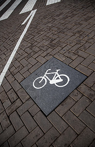沥青上的自行车信号路面地面车道城市蓝色娱乐途径小路轮子线条图片