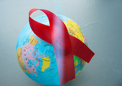 12月1日世界艾滋病日 以红色丝带环绕世界缺陷全世界活动监视斗争预防失败免疫药品治疗图片