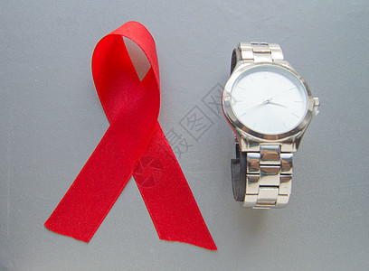 世界艾滋病日 红丝带和时钟的象征不要浪费时间开始治疗组织斗争缺陷行动疾病团结免疫癌症泄漏帮助图片