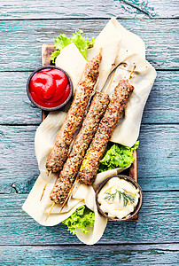 土耳其烤肉饭Kebab - 烤肉和草药背景