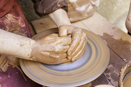 传统陶工压力陶器创造力手工工作室拇指女士工匠制品调子图片