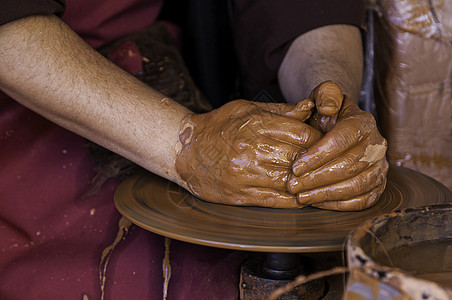 陶器之手的粘土水壶车轮艺术家陶工工匠黏土工艺艺术孩子手工业图片