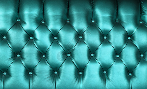 蓝绿色皮革 capitone 背景纹理家具手工钻石床头板装饰蓝色纽扣风格奢华簇绒图片